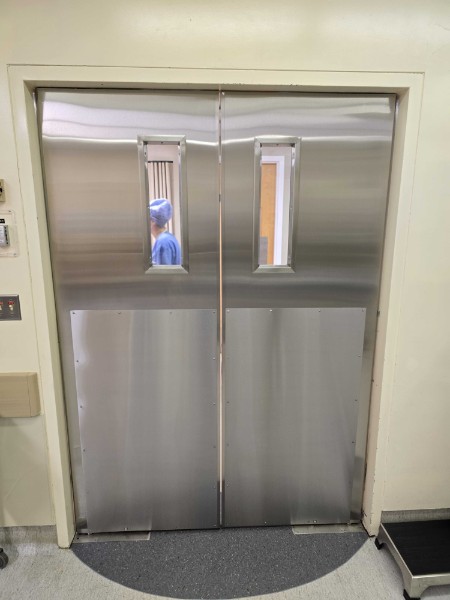 Stainless steel pressed-steel doors installed at a hospital operating room